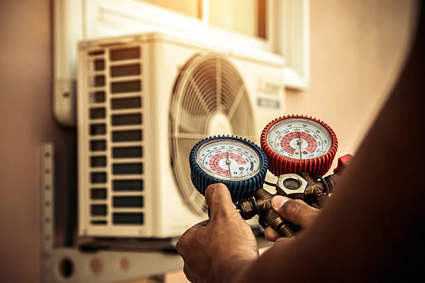 Professional Heat Pump Repair technician working in La Crosse, KS